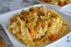 Receta de mafaldine con tomate y berenjena