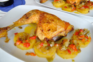 Receta de contramuslos de pollo con patatas al horno