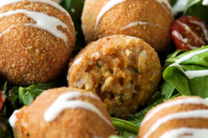 Receta de croquetas especiales de arroz y queso